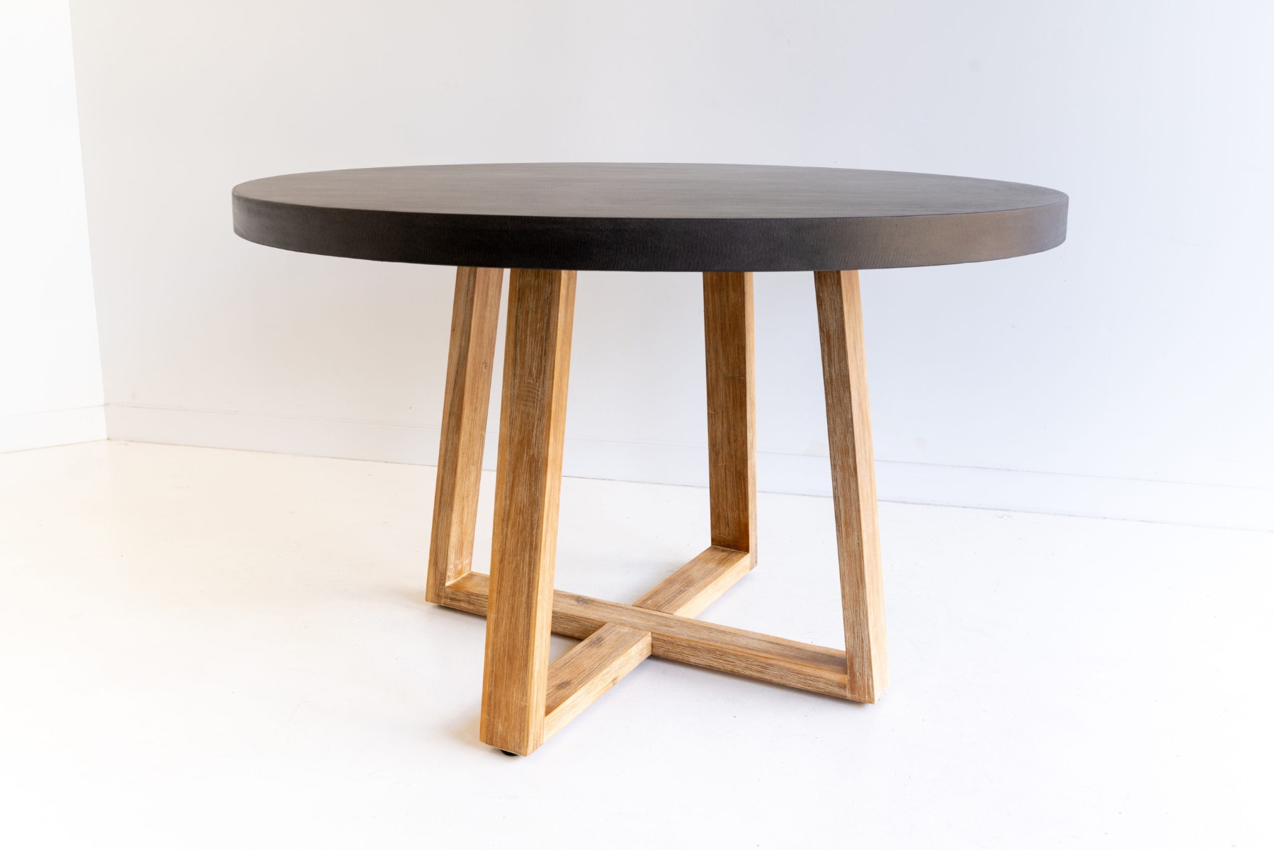 1.0m Alta Round Elkstone Dining Table – Ebony Black with Light Honey Legs - Image 11