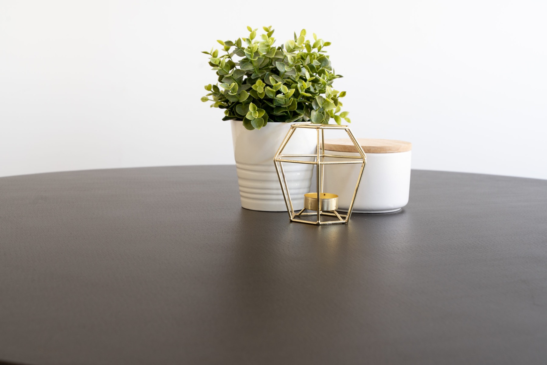 1.0m Alta Round Elkstone Dining Table – Ebony Black with Light Honey Legs - Image 14