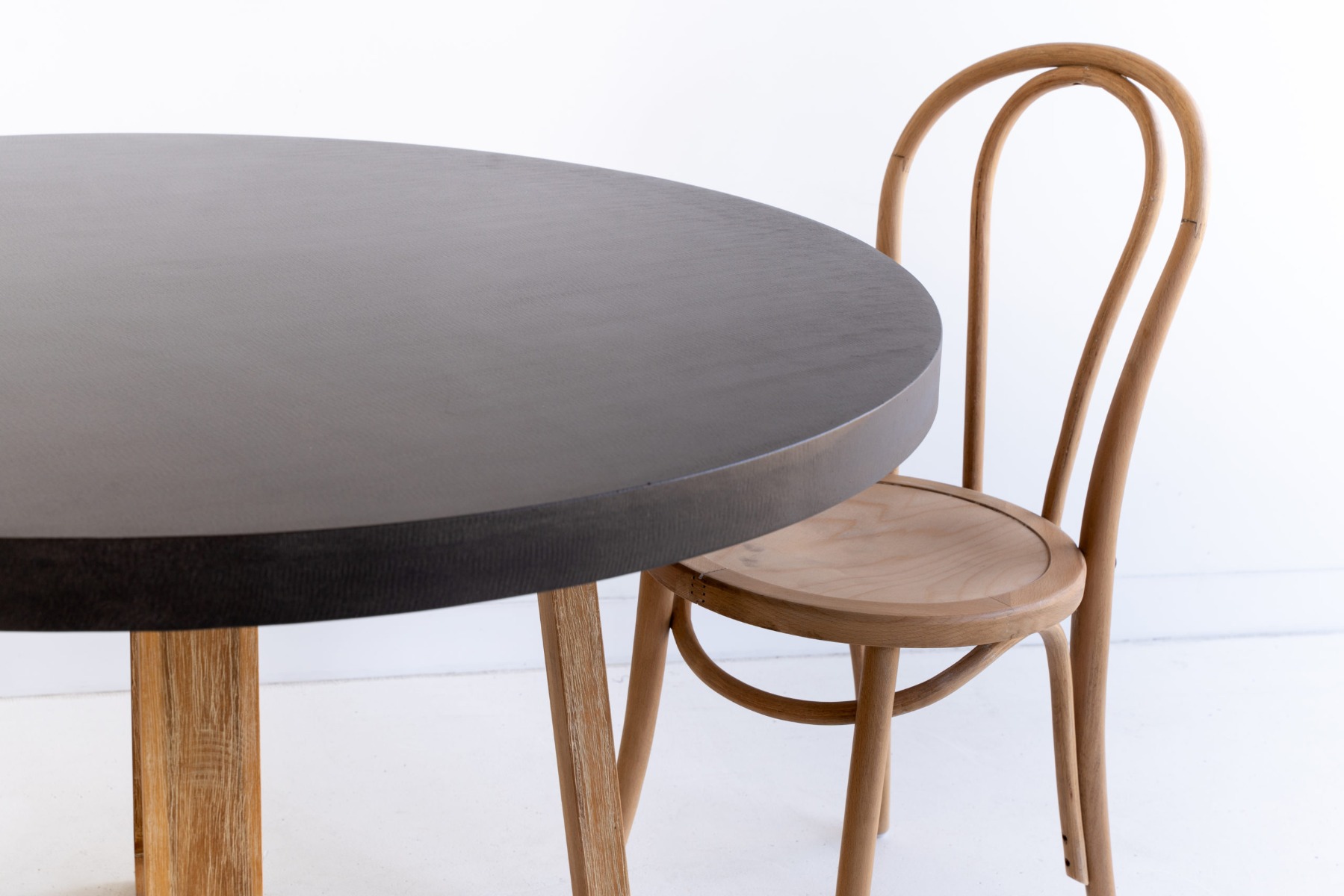 1.2m Alta Elkstone Round Dining Table – Ebony Black with Light Honey Legs - Image 12